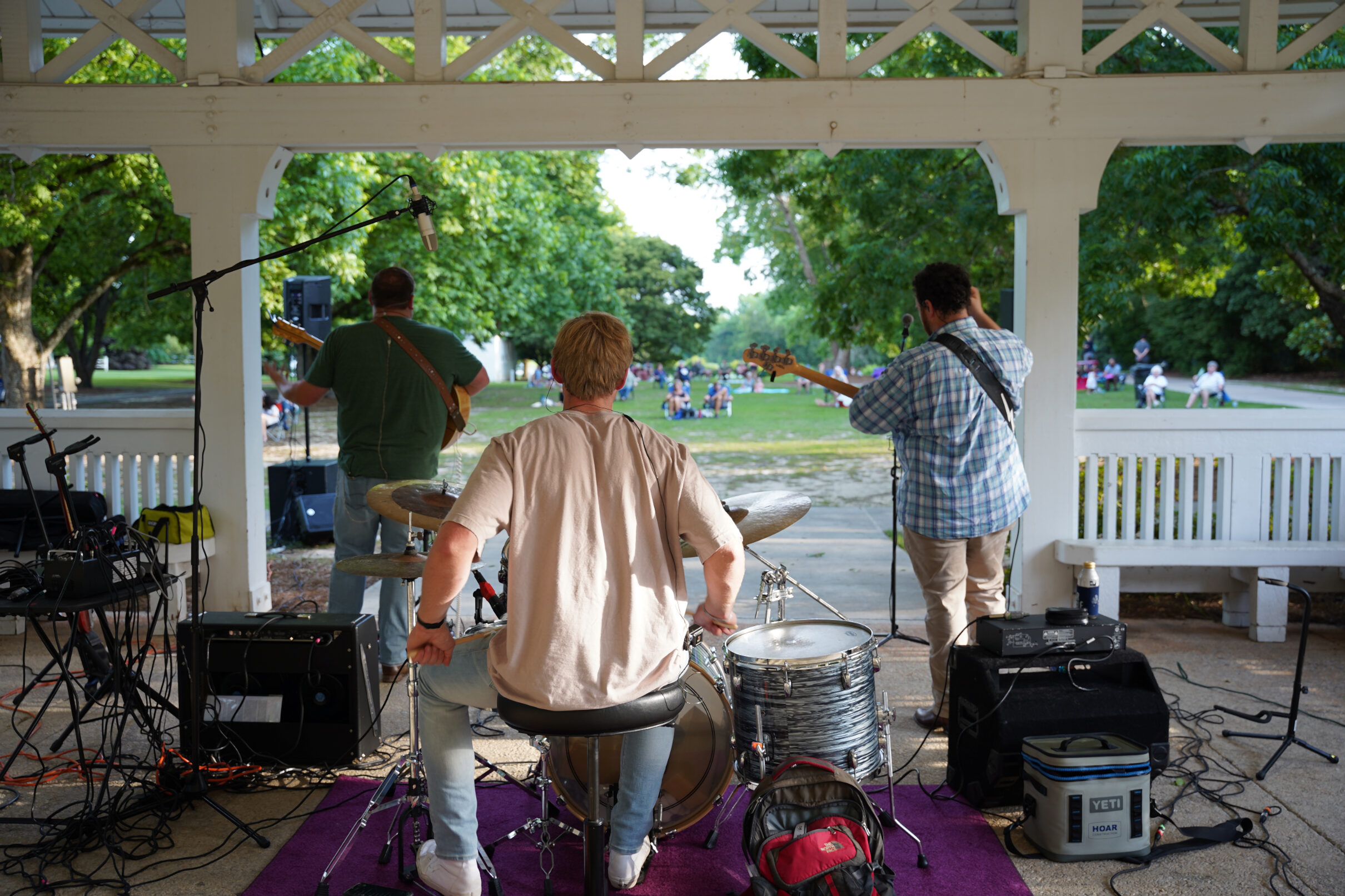 View of a crowd from behind a band.